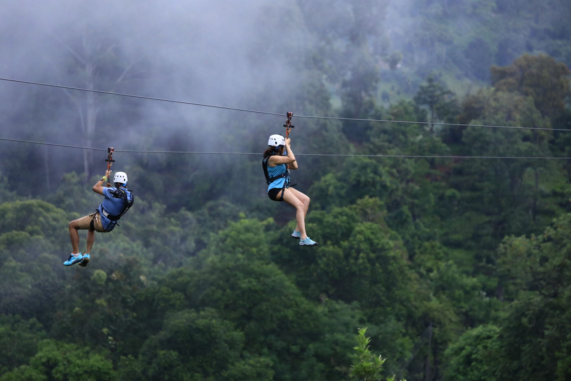 Two Guests Ziplining Through Flying Ravana Adventure Park
