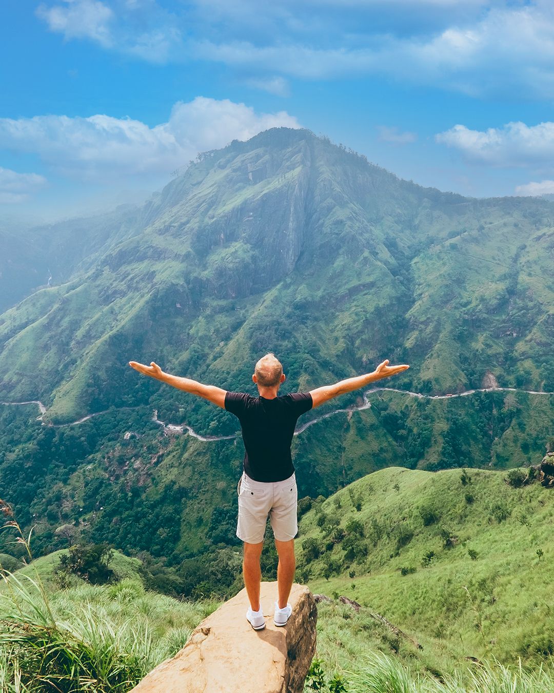 Male Guest Facing the Mountains